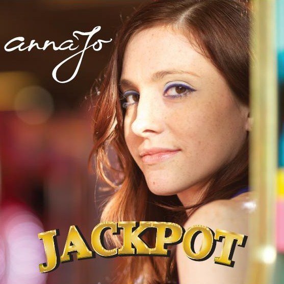 Jackpot cover showing a closeup of annaJo in a casino with bright lights